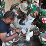 Brimob Polda Kepri Bersama Pasukan TNI Mengelar Pengobatan Gratis Distrik Papua