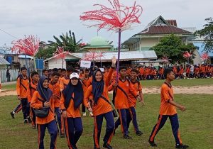 Semarak Milad ke 67 SMPN 1 Bunguran Timur Pawai Meriah Menuju SPANSA CUP III